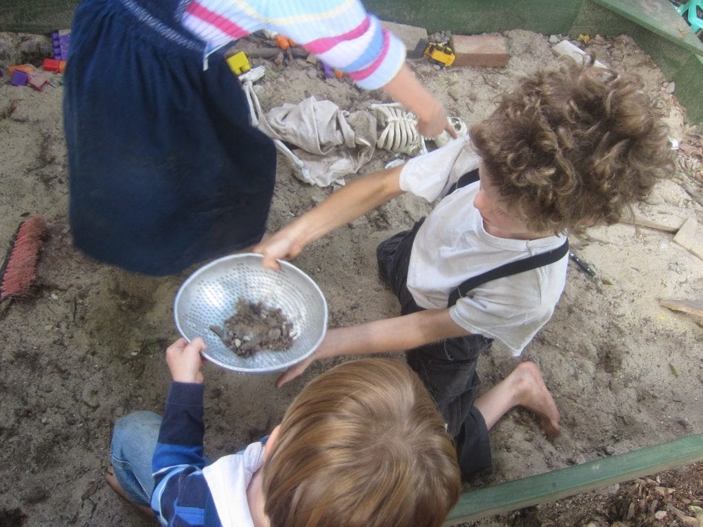 Sifting for sherds, rice and beans...