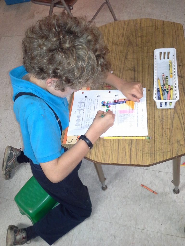 Color coding his paper for even/odd and greater or less than 12